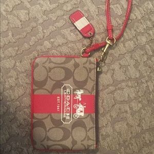 Coach Tan and Red wristlet wallet/clutch.
